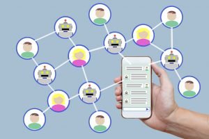Chatbot concept with instant messenger displayed on smart phone and future marketing concept.